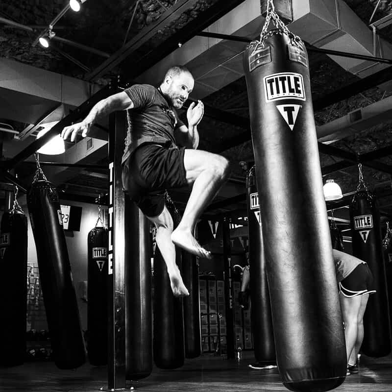 Mixed Martial Arts Lessons for Adults in Apex NC - Flying Knee Black and White MMA